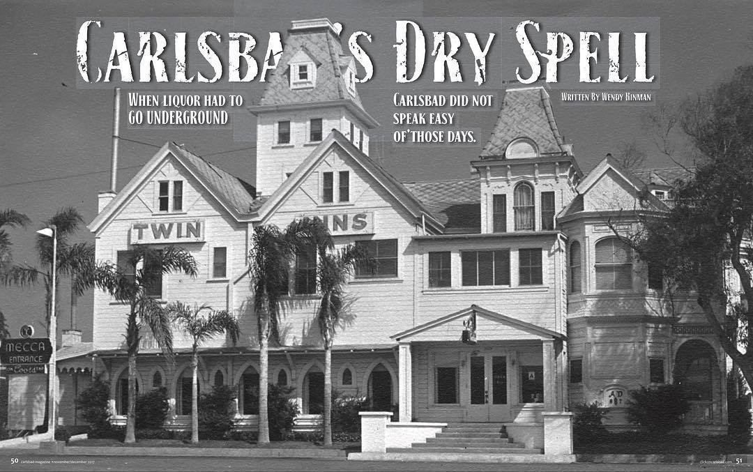 Vintage photo of a large historic building with palm trees, labeled 'Twin Inns.' Text mentions Carlsbad's Dry Spell.