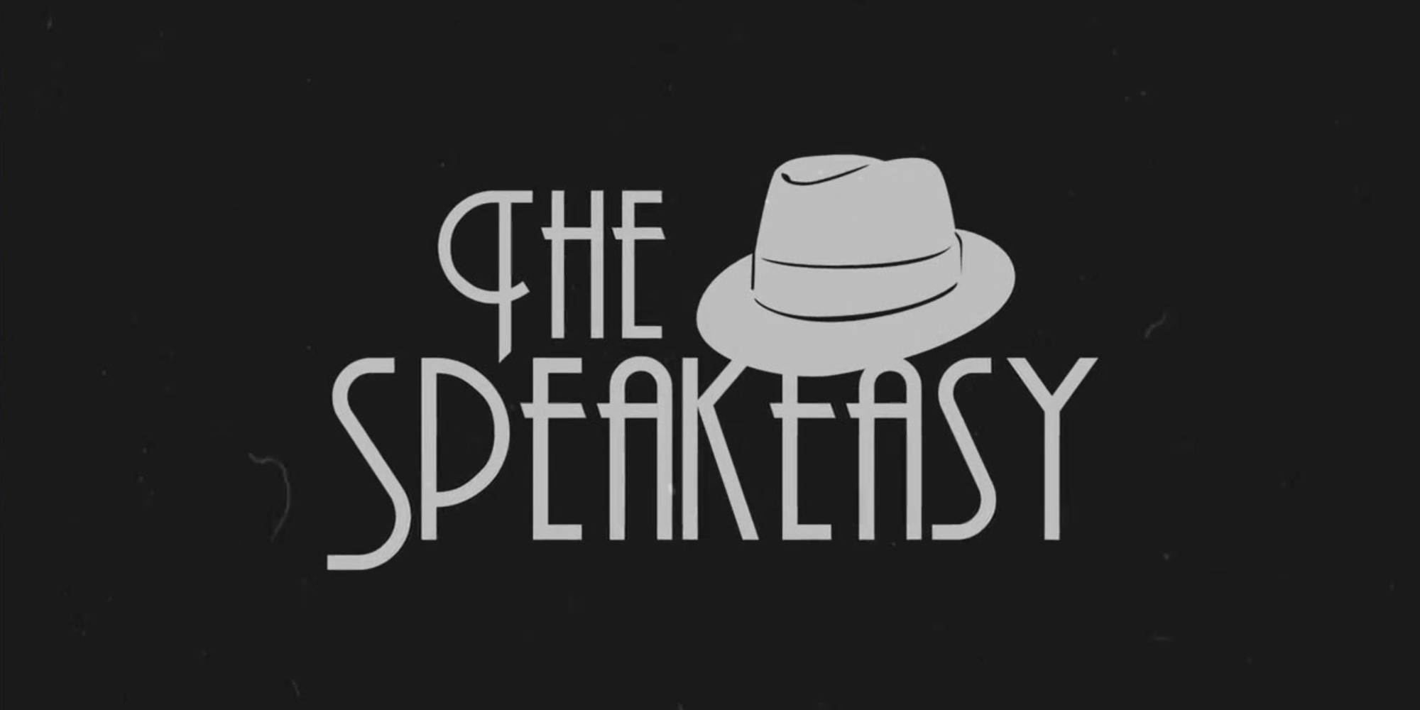 Art Deco text 'The Speakeasy' with a fedora hat on black background.