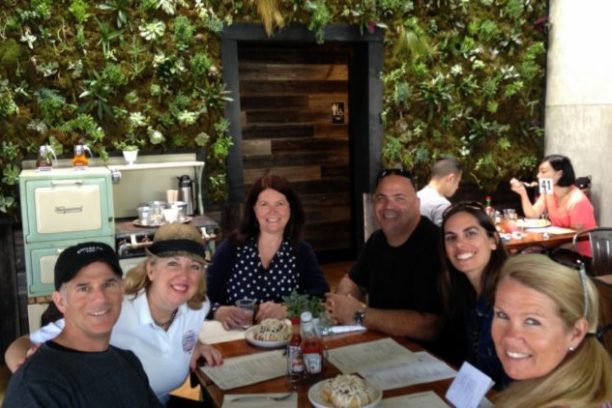 Steve Garvey et al. sitting at a table