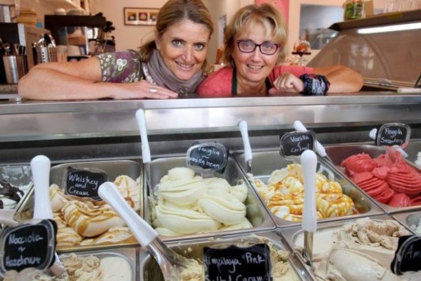 a person cooking food in a kitchen