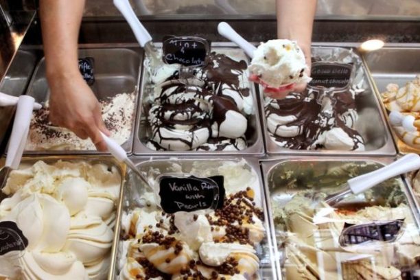 a person cooking food in a kitchen