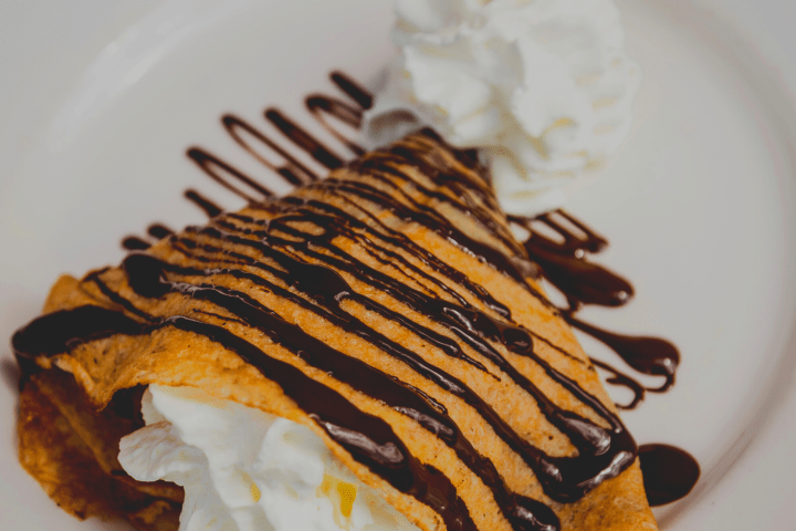 a piece of cake and ice cream on a plate