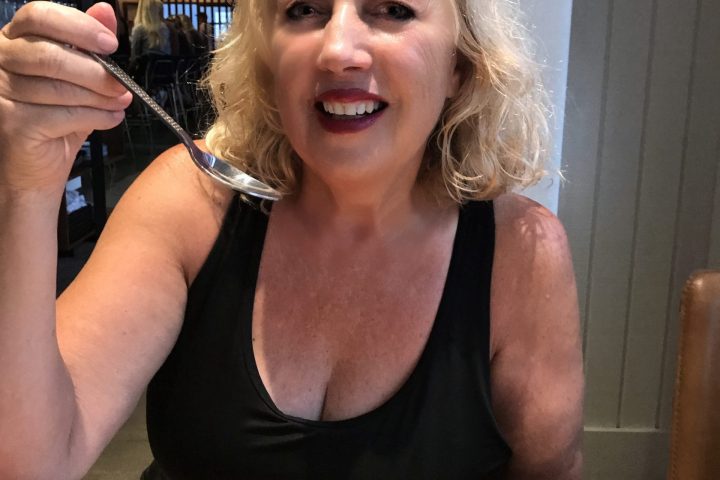 a woman sitting at a table