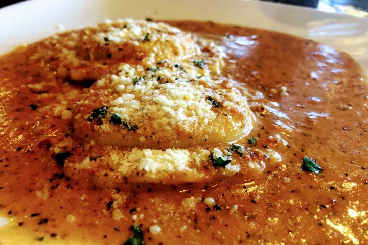 a close up of a plate of pizza