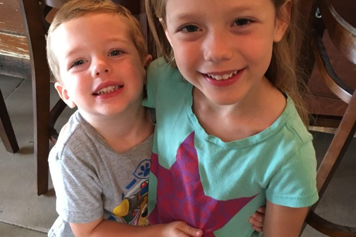 a little girl posing for a picture