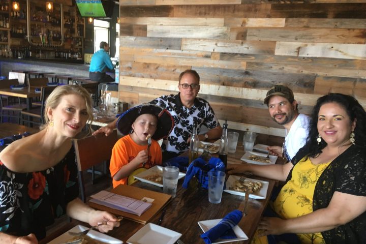 a group of people sitting at a table