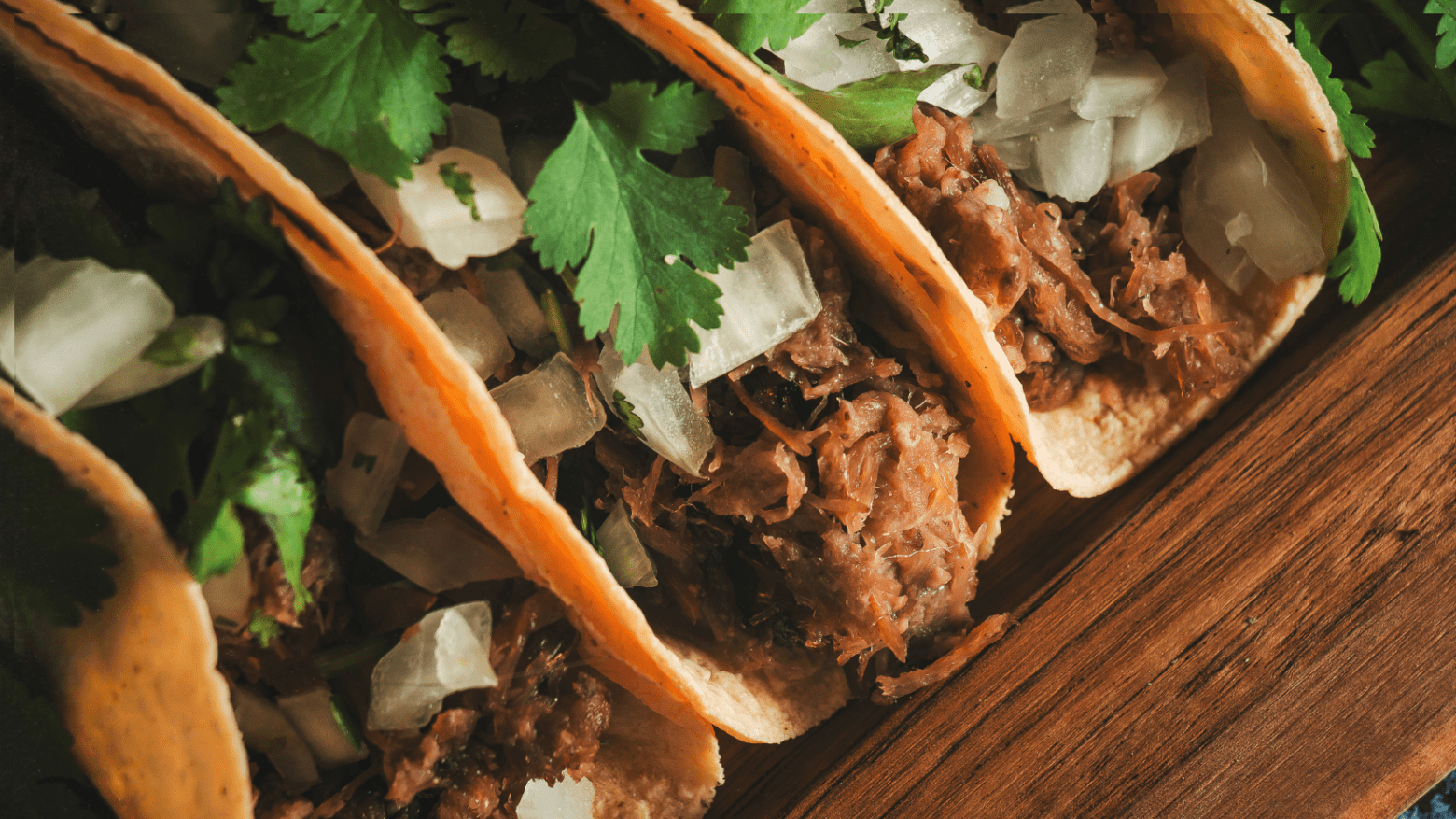 a sandwich sitting on top of a wooden table