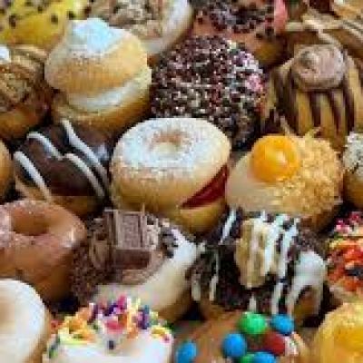a box filled with different kinds of donuts