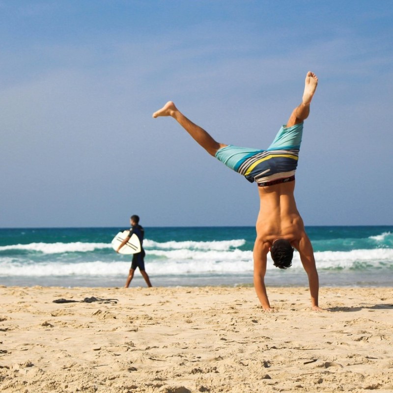 a person walking on a beach