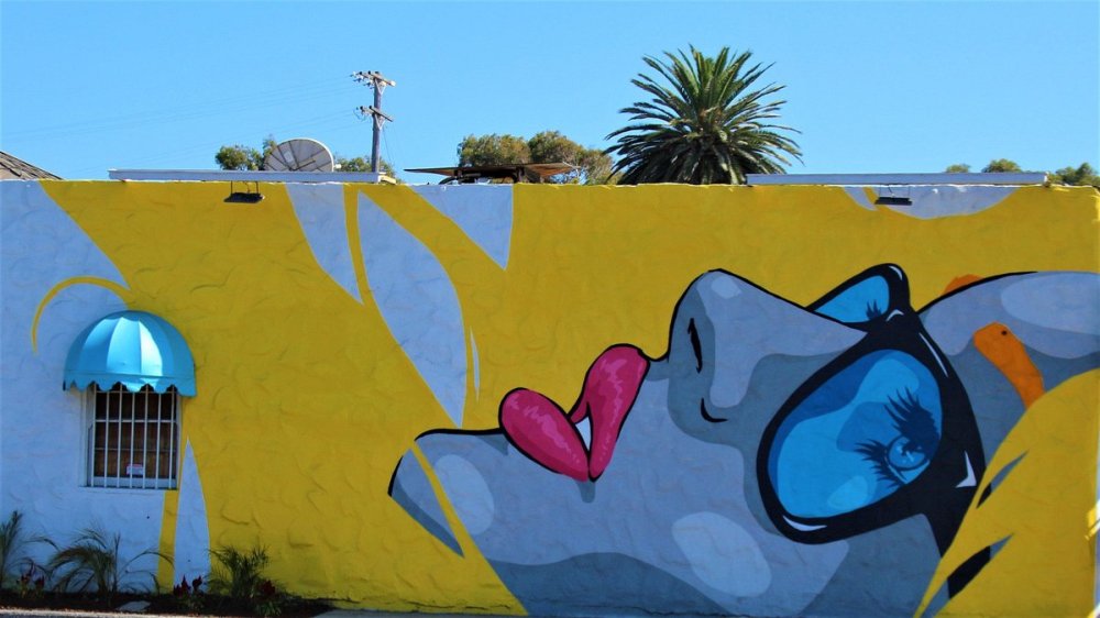 a graffiti covered wall