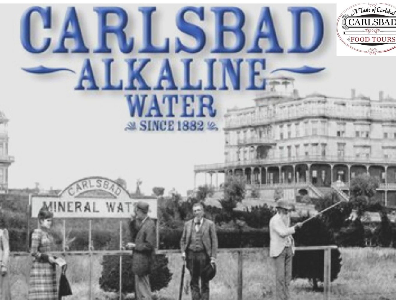 Vintage photo of people by a sign and building, labeled 'Carlsbad Alkaline Water, Since 1882'.
