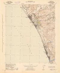 Vintage topographic map of a coastal region with grid lines and detailed terrain markings.